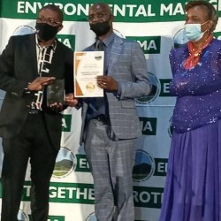 CEO receiving an award from the Minister